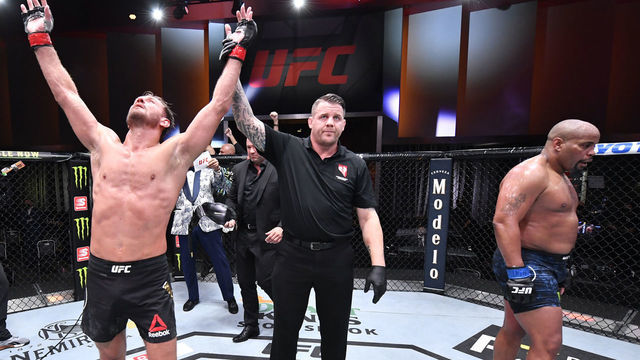 LAS VEGAS, NEVADA - AUGUST 15: In this handout image provided by UFC, Stipe Miocic celebrates after his victory over Daniel Cormier in their UFC heavyweight championship bout during the UFC 252 event at UFC APEX on August 15, 2020 in Las Vegas, Nevada.