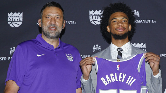 SACRAMENTO, CA - JUNE 23: GM Vlade Divac and Head Coach Dave Joerger of the Sacramento Kings introduce Marvin Bagley III to the media on June 23, 2018 at the Golden 1 Center in Sacramento, California. NOTE TO USER: User expressly acknowledges and agrees that, by downloading and/or using this Photograph, user is consenting to the terms and conditions of the Getty Images License Agreement. Mandatory Copyright Notice: Copyright 2017 NBAE Vlade Divac,Marvin Bagley III,Dave Joerger