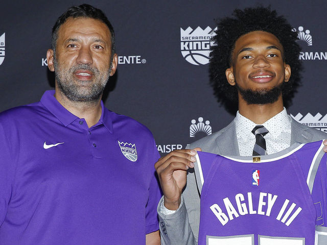 SACRAMENTO, CA - JUNE 23: GM Vlade Divac and Head Coach Dave Joerger of the Sacramento Kings introduce Marvin Bagley III to the media on June 23, 2018 at the Golden 1 Center in Sacramento, California. NOTE TO USER: User expressly acknowledges and agrees that, by downloading and/or using this Photograph, user is consenting to the terms and conditions of the Getty Images License Agreement. Mandatory Copyright Notice: Copyright 2017 NBAE Vlade Divac,Marvin Bagley III,Dave Joerger