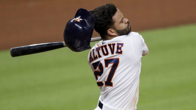 HOUSTON, TEXAS - AUGUST 10: Jose Altuve #27 of the Houston Astros strikes out in the eighth inning against the San Francisco Giants at Minute Maid Park on August 10, 2020 in Houston, Texas.