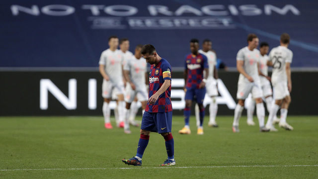 LISBON, PORTUGAL - AUGUST 14: Lionel Messi of FC Barcelona looks dejected after his team concede during the UEFA Champions League Quarter Final match between Barcelona and Bayern Munich at Estadio do Sport Lisboa e Benfica on August 14, 2020 in Lisbon, Portugal.