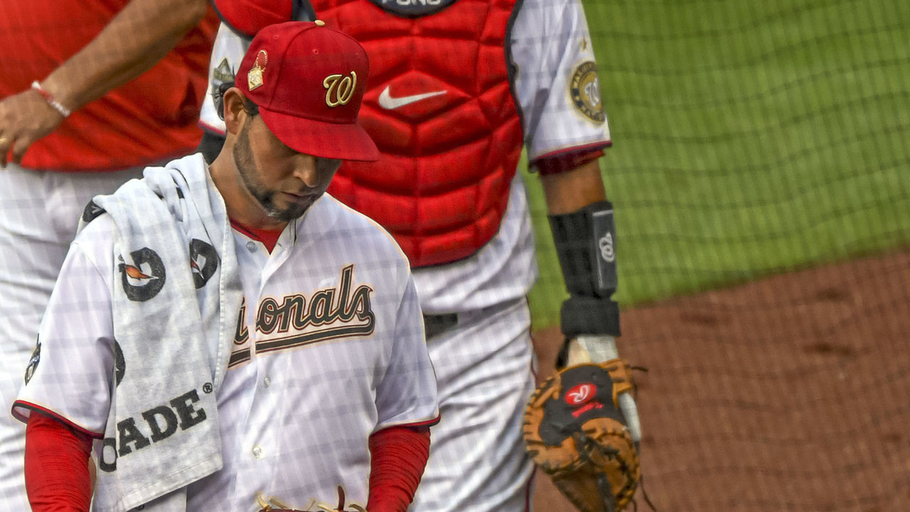 WASHINGTON, DC - AUGUST 07: Washington Nationals starting pitcher Anibal Sanchez (19) is followed by catcher Kurt Suzuki (28) into the dugout for the game against the Baltimore Orioles on August 7, 2020, at Nationals Park, in Washington D.C.