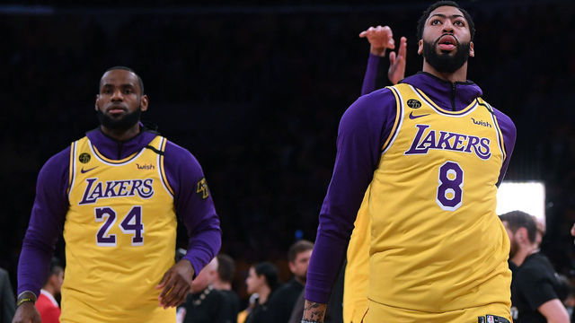 LOS ANGELES, CALIFORNIA - JANUARY 31: Anthony Davis and LeBron James wear number 8 and number 24, to honor Kobe Bryant before the game against the Portland Trail Blazers at Staples Center on January 31, 2020 in Los Angeles, California.