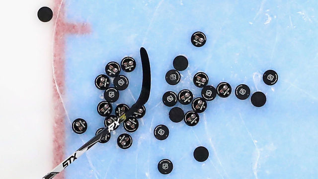 UNIONDALE, NEW YORK - OCTOBER 12: Pucks sit on the ice during warm-ups prior to the game between the Florida Panthers and the New York Islanders at NYCB Live's Nassau Coliseum on October 12, 2019 in Uniondale, New York.