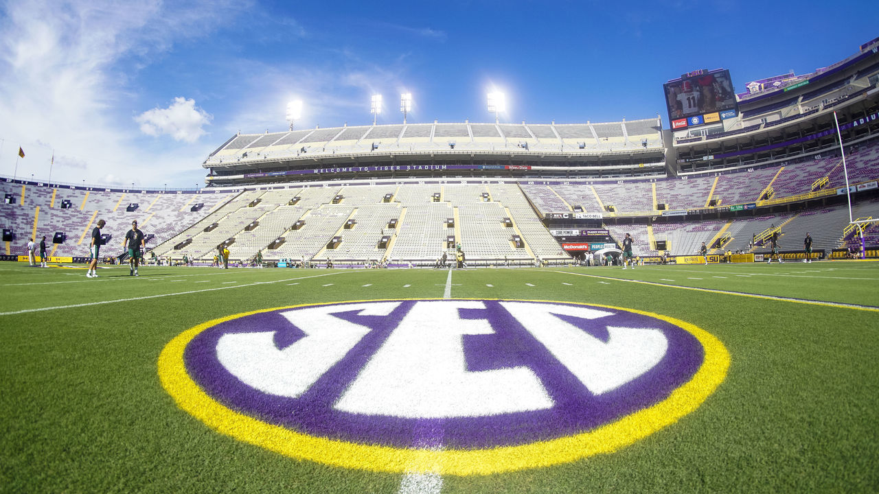 BATON ROUGE, LA - SEPTEMBER 08: The SEC logo in purple and gold on the Tiger Stadium field before the LSU Tigers 31-0 win over the Southeastern Louisiana Lions on September 08, 2018, at Tiger Stadium in Baton Rouge, Louisiana.