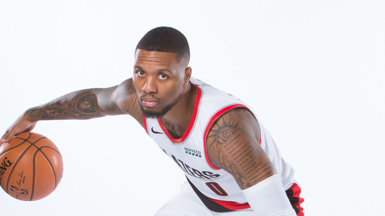 PORTLAND, OR - SEPTEMBER 30: Damian Lillard #0 of the Portland Trail Blazers poses for a portrait during Media Day September 30, 2019 at the Veterans Memorial Coliseum Portland, Oregon. Mandatory Copyright Notice: Copyright 2019 NBAE