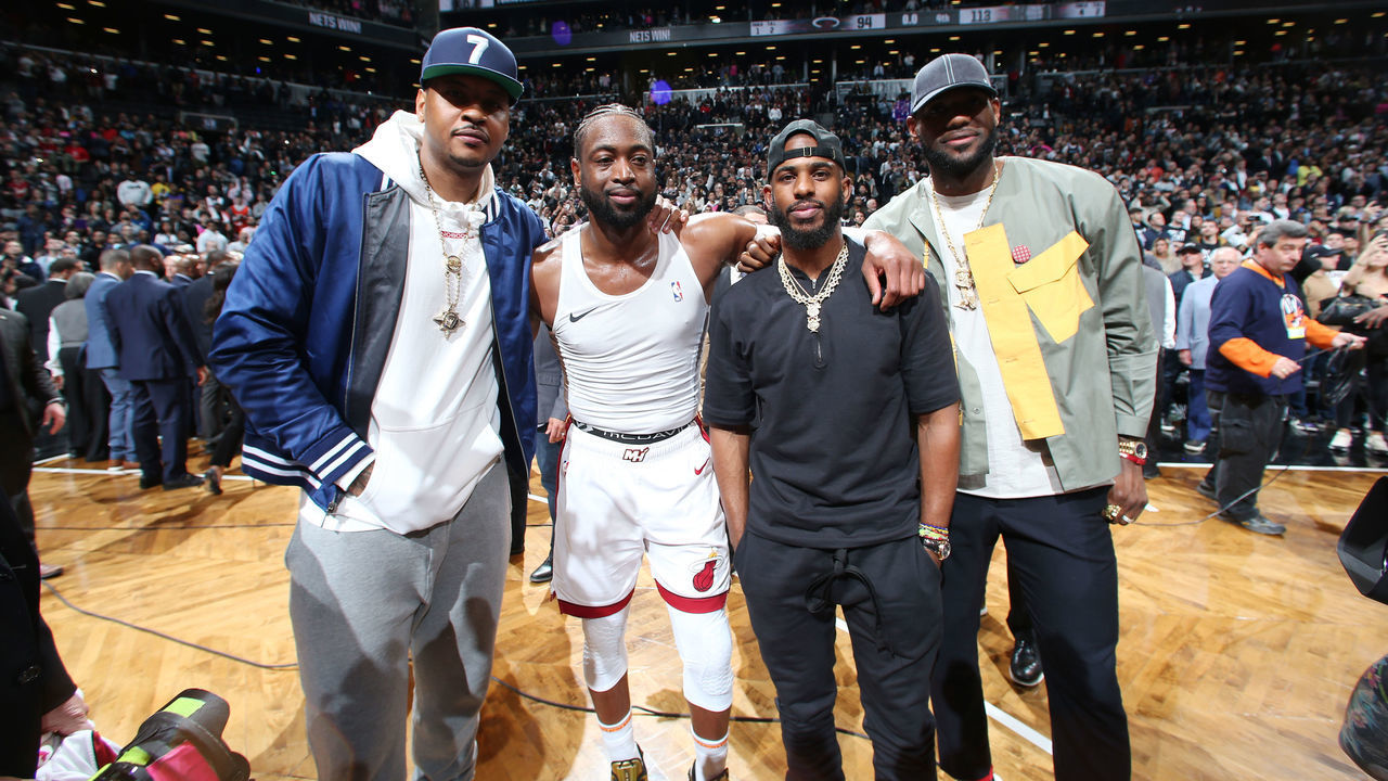 BROOKLYN, NY - APRIL 10: Carmelo Anthony, Dwyane Wade #3 of the Miami Heat, Chris Paul #3 of the Houston Rockets and LeBron James #23 of the Los Angeles Lakers pose for a photo after Wades last game against the Brooklyn Nets on April 10, 2019 at Barclays Center in Brooklyn, New York. Mandatory Copyright Notice: Copyright 2019 NBAE