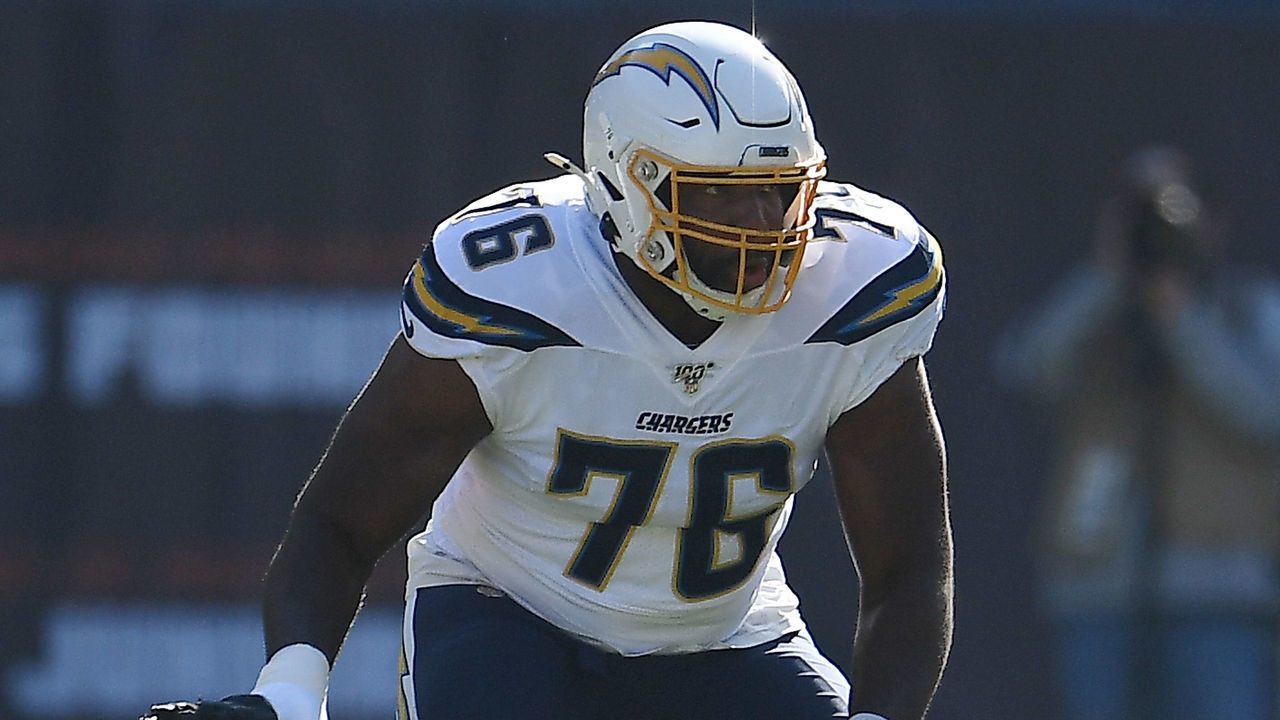 CHICAGO, ILLINOIS - OCTOBER 27: Russell Okung #76 of the Los Angeles Chargers reacts to a play during a game against the Chicago Bears at Soldier Field on October 27, 2019 in Chicago, Illinois. The Chargers defeated the Bears 17-16.