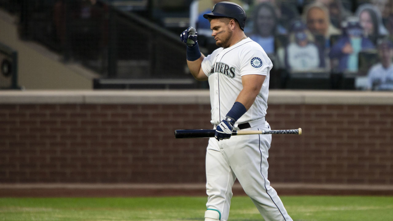 SEATTLE, WA - AUGUST 05: Daniel Vogelbach #20 of the Seattle Mariners walks back to the dugout after fouling out during the fifth inning against the Los Angeles Angels at T-Mobile Park on August 5, 2020 in Seattle, Washington. The Mariners beat the Angels 7-6.