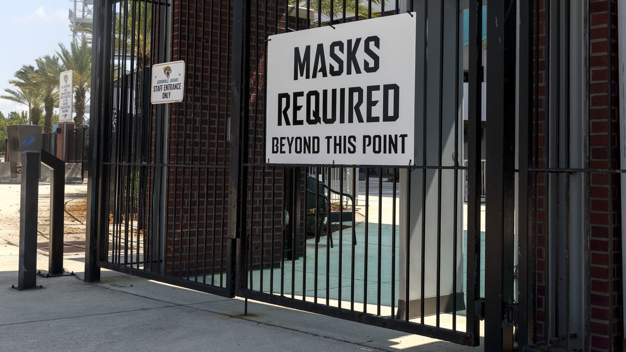 JACKSONVILLE, FL - AUGUST 17: A general view of a sign on the west gate entrance of TIAA Bank Field, home of the Jacksonville Jaguars requiring anyone who enter, must wear a facial mask on August 17, 2020 in Jacksonville, Florida. *** Local Caption ***
