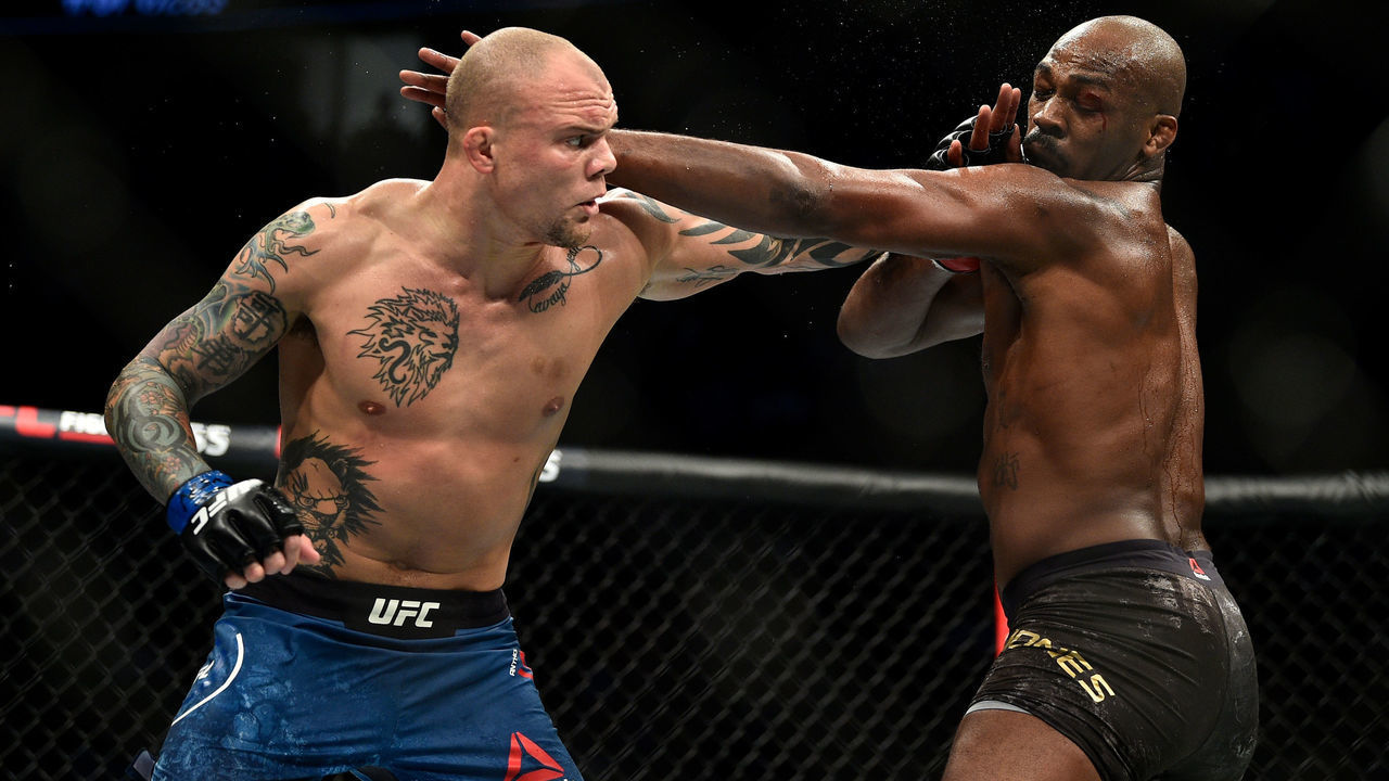 LAS VEGAS, NEVADA - MARCH 02: (L-R) Anthony Smith punches Jon Jones in their light heavyweight championship bout during the UFC 235 event at T-Mobile Arena on March 2, 2019 in Las Vegas, Nevada.