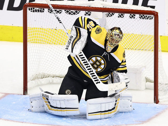 TORONTO, ONTARIO - AUGUST 13: Tuukka Rask #40 of the Boston Bruins stops a shot against the Carolina Hurricanes during the first period in Game Two of the Eastern Conference First Round during the 2020 NHL Stanley Cup Playoffs at Scotiabank Arena on August 13, 2020 in Toronto, Ontario.