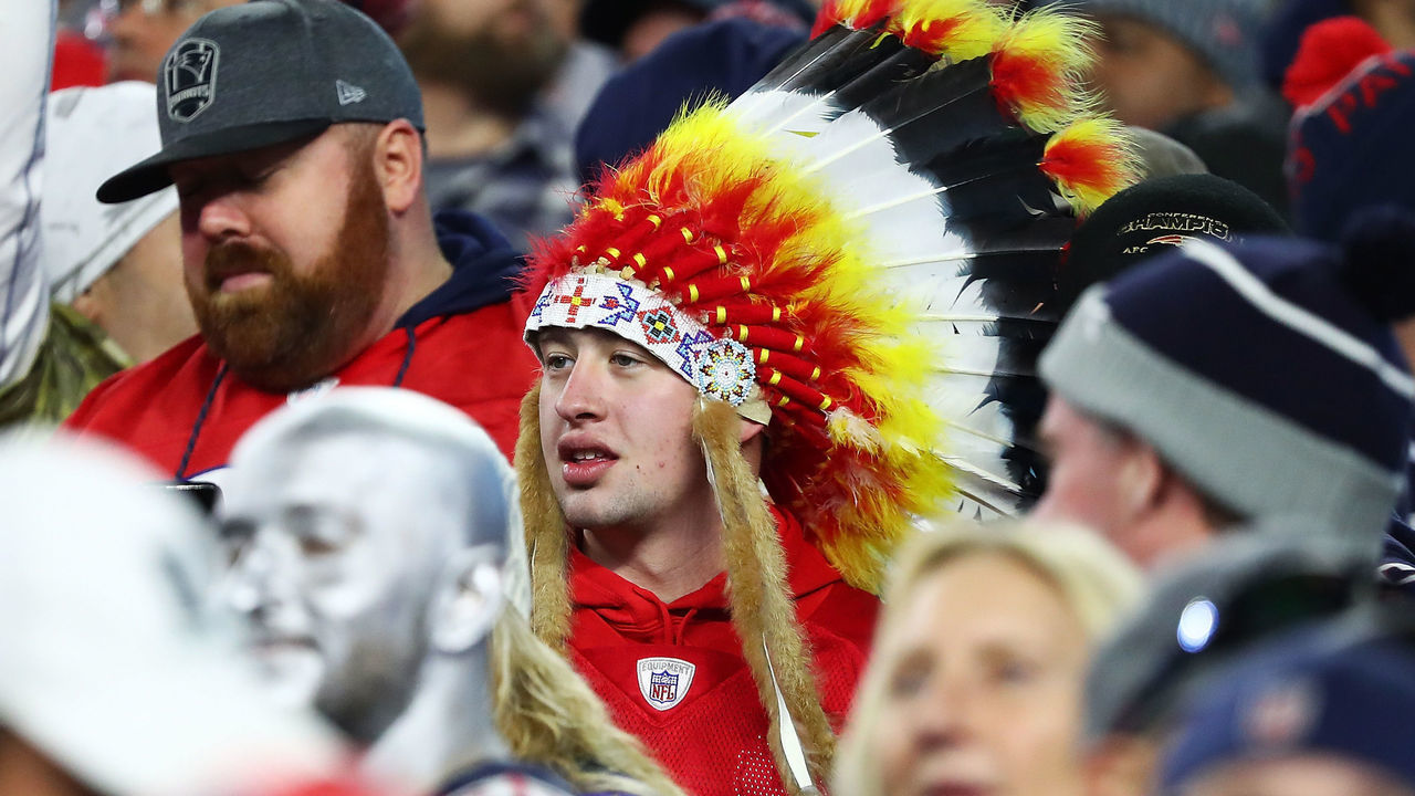 FOXBOROUGH, MA - OCTOBER 14: A fan wears a Native American headdress during a game between the Kansas City Chiefs and the New England Patriots at Gillette Stadium on October 14, 2018 in Foxborough, Massachusetts.