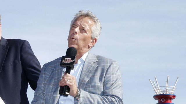 CINCINNATI, OH - SEPTEMBER 26: Cincinnati Reds broadcaster Marty Brennaman attends a postgame ceremony with son Thom Brennaman, right, broadcast partner Jeff Brantley, left, emcee Jim Day after calling his final game in the booth against the Milwaukee Brewers at Great American Ball Park on September 26, 2019 in Cincinnati, Ohio. The Brewers defeated the Reds 5-3.