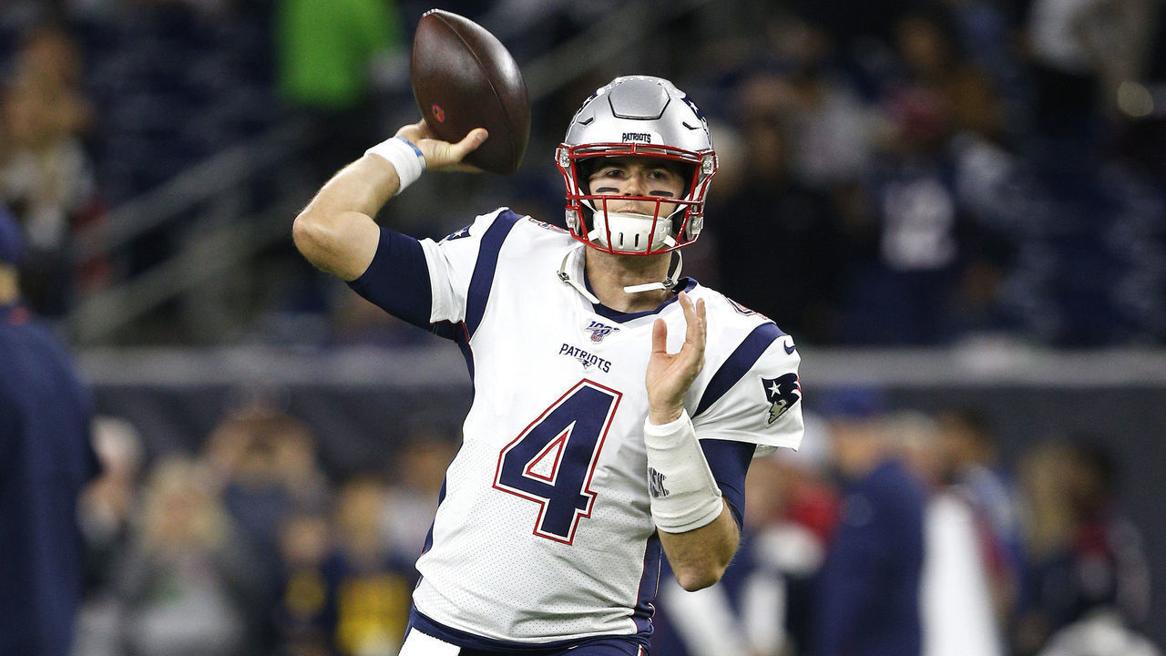 HOUSTON, TEXAS - DECEMBER 01: Jarrett Stidham #4 of the New England Patriots warms up prior to the game against the Houston Texans at NRG Stadium on December 01, 2019 in Houston, Texas.