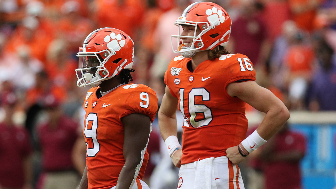 CLEMSON, SC - OCTOBER 12: Travis Etienne (9) running back and Trevor Lawrence (16) quarterback of Clemson during a college football game between Florida State Seminoles and the Clemson Tigers on October 12, 2019, at Clemson Memorial Stadium in Clemson, SC.
