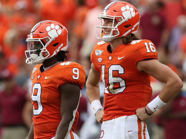 CLEMSON, SC - OCTOBER 12: Travis Etienne (9) running back and Trevor Lawrence (16) quarterback of Clemson during a college football game between Florida State Seminoles and the Clemson Tigers on October 12, 2019, at Clemson Memorial Stadium in Clemson, SC.