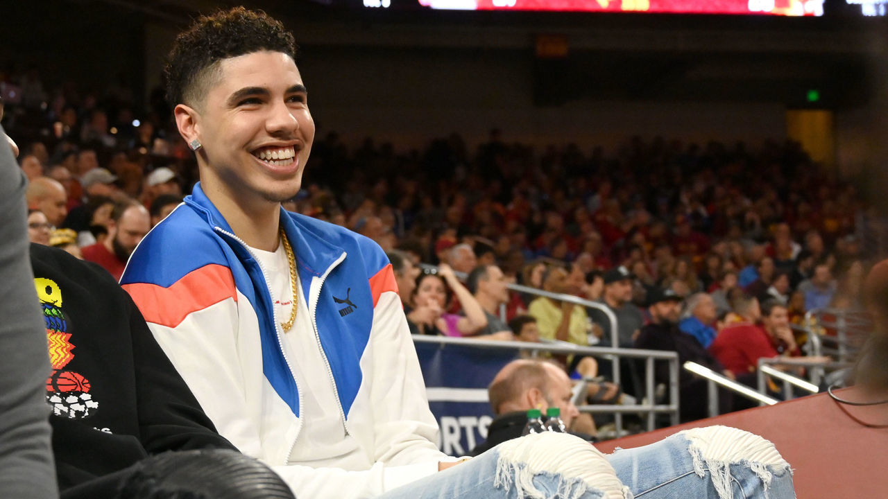 LOS ANGELES, CA - MARCH 07: Professional basketball player LaMelo Ball, right, attends the game between the USC Trojans and the UCLA Bruins at Galen Center on March 7, 2020 in Los Angeles, California.
