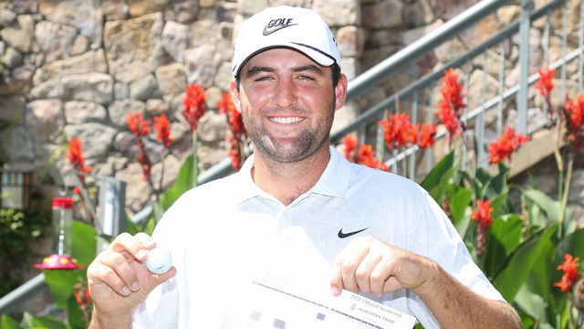 NORTON, MASSACHUSETTS - AUGUST 21: Scottie Scheffler of the United States holds up his ball and score card in celebration after scoring a 59 during the second round of The Northern Trust at TPC Boston on August 21, 2020 in Norton, Massachusetts.