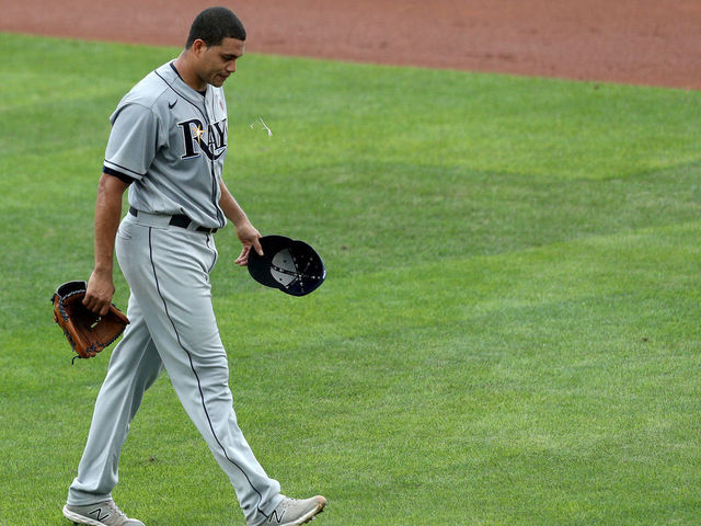 BUFFALO, NEW YORK - AUGUST 16: Yonny Chirinos #72 of the Tampa Bay Rays walks off the field after being taken out of the game during the third inning of game two of a double header against the Toronto Blue Jays at Sahlen Field on August 16, 2020 in Buffalo, New York. The Blue Jays are the home team and are playing their home games in Buffalo due to the Canadian government’s policy on coronavirus (COVID-19).
