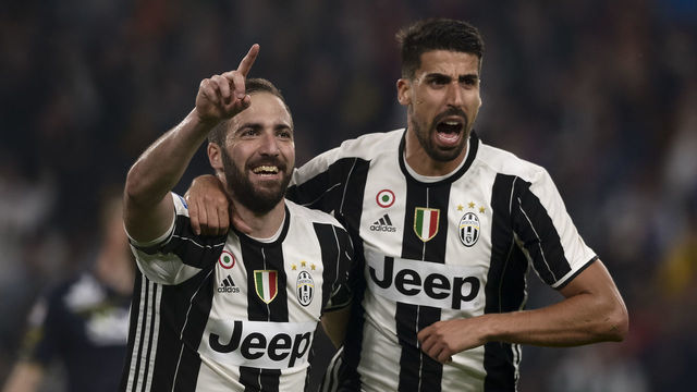 JUVENTUS STADIUM, TURIN, ITALY - 2017/04/08: Gonzalo Higuain (left) of Juventus FC celebrates with Sami Khedira after scoring a goal during the Serie A football match between Juventus FC and AC ChievoVerona. Juventus FC wins 2-0 over AC ChievoVerona.