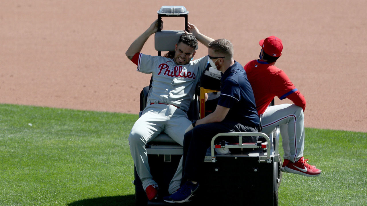 BUFFALO, NEW YORK - AUGUST 20: Jose Alvarez #52 of the Philadelphia Phillies reacts while being carted off the field after being hit by a ball during the fifth inning of game one of a double header Toronto Blue Jays at Sahlen Field on August 20, 2020 in Buffalo, New York. The Blue Jays are the home team and are playing their home games in Buffalo due to the Canadian government’s policy on coronavirus (COVID-19).