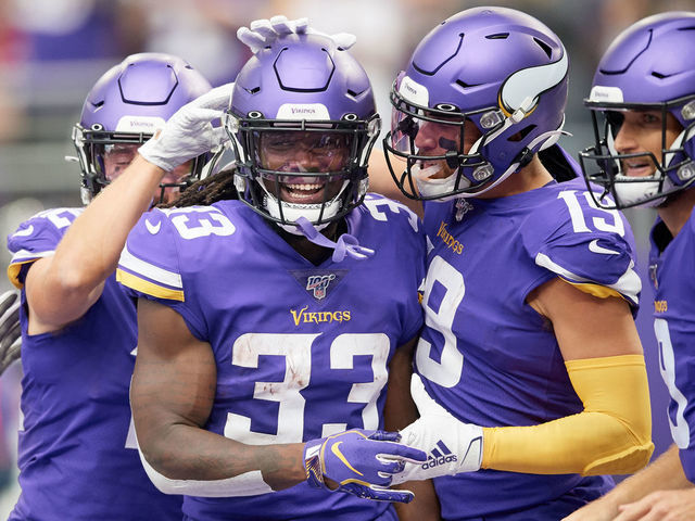 MINNEAPOLIS, MINNESOTA - SEPTEMBER 08: Dalvin Cook #33 of the Minnesota Vikings is congratulated by teammates on scoring a touchdown against the Atlanta Falcons during the game at U.S. Bank Stadium on September 8, 2019 in Minneapolis, Minnesota. The Vikings defeated the Falcons 28-12.