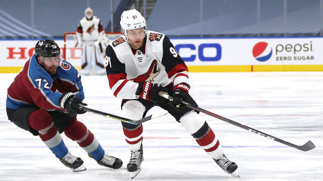 EDMONTON, ALBERTA - AUGUST 12: Joonas Donskoi #72 of the Colorado Avalanche challenges Taylor Hall #91 of the Arizona Coyotes during the third period of Game One of the Western Conference First Round of the 2020 NHL Stanley Cup Playoff at Rogers Place on August 12, 2020 in Edmonton, Alberta.