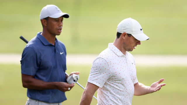 NORTON, MASSACHUSETTS - AUGUST 22: (L-R) Tiger Woods of the United States and Rory McIlroy of Northern Ireland walk off the first tee during the third round of The Northern Trust at TPC Boston on August 22, 2020 in Norton, Massachusetts.