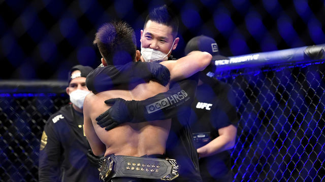 JACKSONVILLE, FLORIDA - MAY 09: Henry Cejudo of the United States celebrates after defeating Dominick Cruz of the United States in their bantamweight title fight during UFC 249 at VyStar Veterans Memorial Arena on May 09, 2020 in Jacksonville, Florida.
