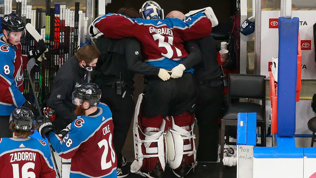 EDMONTON, ALBERTA - AUGUST 22: Philipp Grubauer #31 of the Colorado Avalanche is taken off the ice by trainers following a second period injury against the Dallas Stars in Game One of the Western Conference Second Round during the 2020 NHL Stanley Cup Playoffs at Rogers Place on August 22, 2020 in Edmonton, Alberta, Canada.