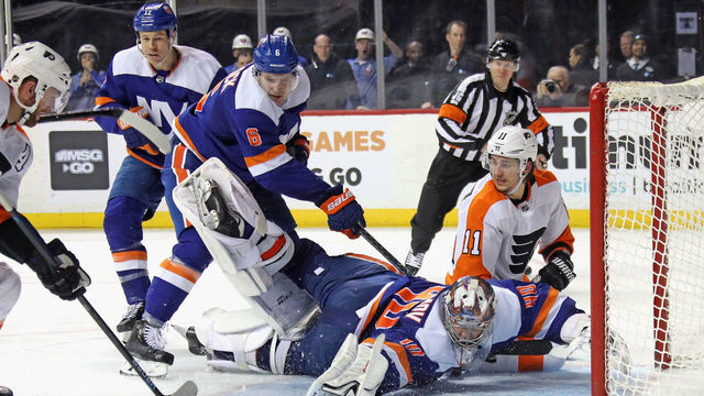 NEW YORK, NEW YORK - FEBRUARY 11: Semyon Varlamov #40 of the New York Islanders makes the third period save against the Philadelphia Flyers at the Barclays Center on February 11, 2020 in the Brooklyn borough of New York City. The Islanders defeated the Flyers 5-3.
