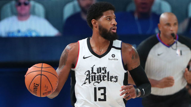 ORLANDO, FL - AUGUST 23: Paul George #13 of the LA Clippers handles the ball against the Dallas Mavericks during Round One, Game Four of the NBA Playoffs on August 23, 2020 at the AdventHealth Arena at ESPN Wide World Of Sports Complex in Orlando, Florida. NOTE TO USER: User expressly acknowledges and agrees that, by downloading and/or using this Photograph, user is consenting to the terms and conditions of the Getty Images License Agreement. Mandatory Copyright Notice: Copyright 2020 NBAE