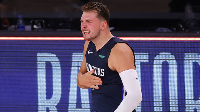 LAKE BUENA VISTA, FLORIDA - AUGUST 23: Luka Doncic #77 of the Dallas Mavericks celebrates a game winning three point basket against the LA Clippers during overtime in Game Four of the Western Conference First Round during the 2020 NBA Playoffs at AdventHealth Arena at ESPN Wide World Of Sports Complex on August 23, 2020 in Lake Buena Vista, Florida.
