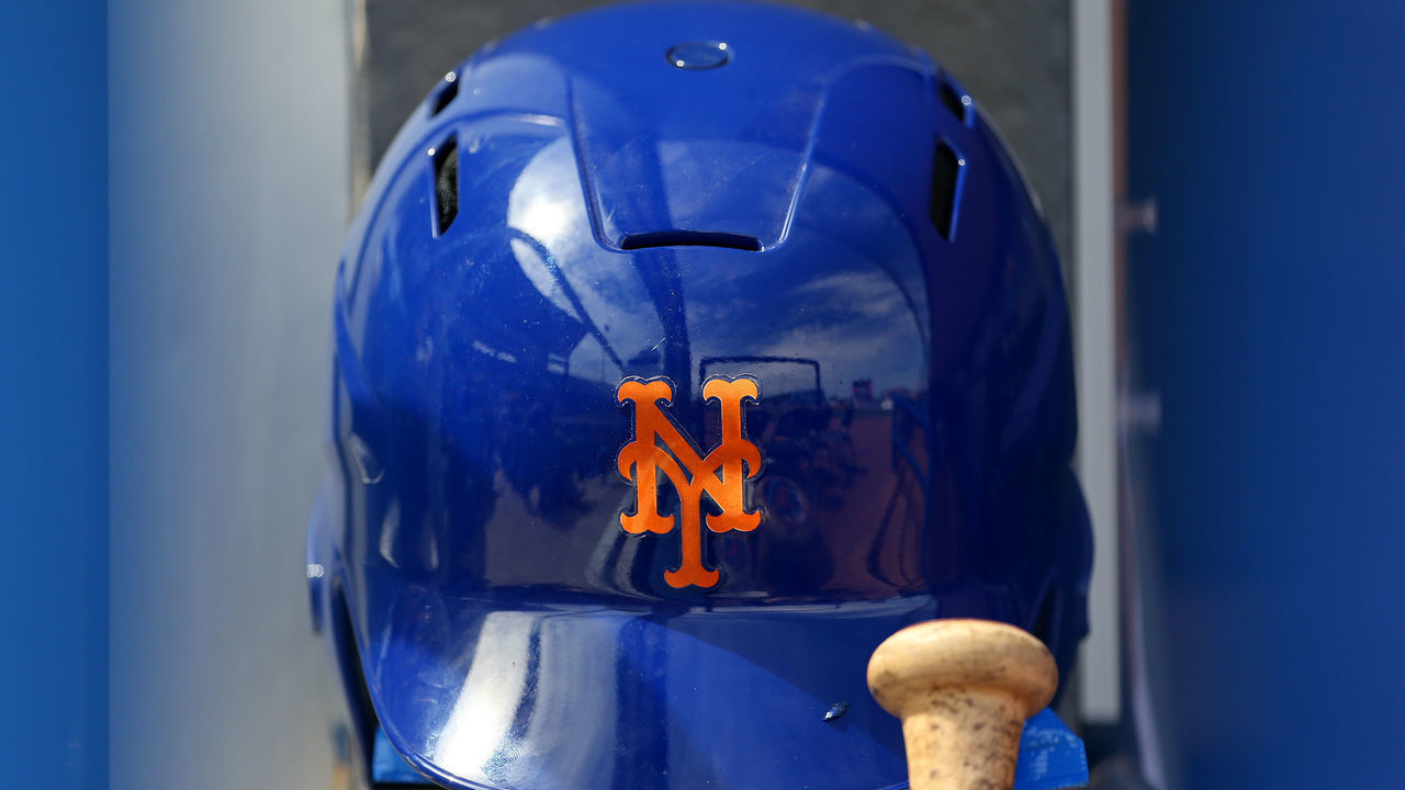 PORT ST. LUCIE, FL - MARCH 08: A New York Mets batting helmet in the dugout before a spring training baseball game against the Houston Astros at Clover Park on March 8, 2020 in Port St. Lucie, Florida. The Mets defeated the Astros 3-1.