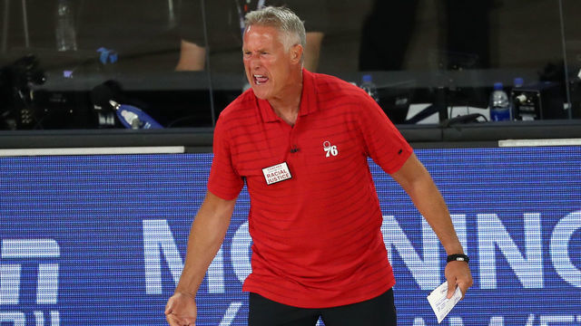 LAKE BUENA VISTA, FLORIDA - AUGUST 23: Head coach Brett Brown of the Philadelphia 76ers reacts after receiving a technical foul against the Boston Celtics during the third quarter in Game Four of the first round of the playoffs at The Field House at ESPN Wide World Of Sports Complex on August 23, 2020 in Lake Buena Vista, Florida.