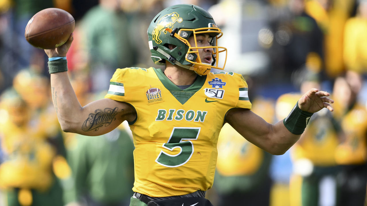 FRISCO, TX - JANUARY 11: Trey Lance #5 of the North Dakota State Bison looks to pass the ball against the James Madison Dukes during the Division I FCS Football Championship held at Toyota Stadium on January 11, 2020 in Frisco, Texas. North Dakota State defeated James Madison 28-20 to win the national title.