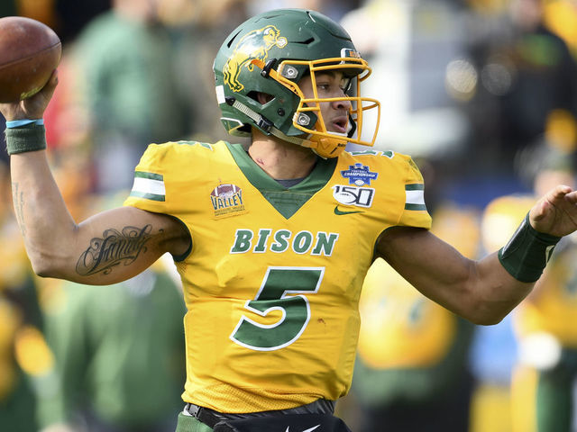 FRISCO, TX - JANUARY 11: Trey Lance #5 of the North Dakota State Bison looks to pass the ball against the James Madison Dukes during the Division I FCS Football Championship held at Toyota Stadium on January 11, 2020 in Frisco, Texas. North Dakota State defeated James Madison 28-20 to win the national title.