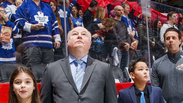 TORONTO, ON - JANUARY 3: A young girl stands next to Bruce Boudreau head coach of the Minnesota Wild before playing the Toronto Maple Leafs in the "Next Generation Game" at the Scotiabank Arena on January 3, 2019 in Toronto, Ontario, Canada.