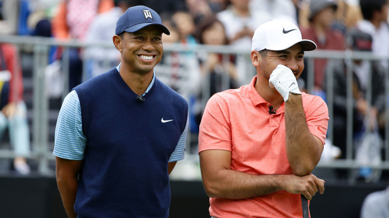 INZAI, JAPAN - OCTOBER 21: Tiger Woods of the United States and Jason Day of Australia share a laugh on the first tee during The Challenge: Japan Skins at Accordia Golf Narashino Country Club on October 21, 2019 in Inzai, Chiba, Japan.