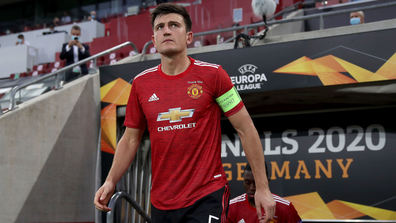 COLOGNE, GERMANY - AUGUST 10: In this handout image provided by UEFA Harry Maguire of Manchester United walks out to the pitch prior to the UEFA Europa League Quarter Final between Manchester United and FC Kobenhavn at RheinEnergieStadion on August 10, 2020 in Cologne, Germany.