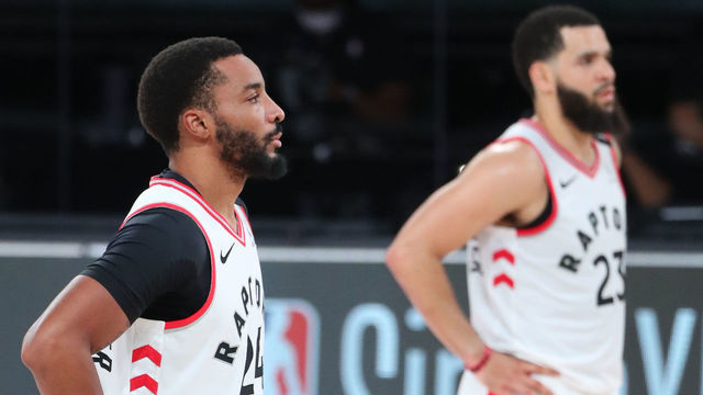 Orlando, FL - AUGUST 17: Norman Powell #24 and Fred VanVleet #23 of the Toronto Raptors looks on during the game against the Brooklyn Nets during Round One, Game One of the NBA Playoffs on August 17, 2020 in Orlando, Florida at AdventHealth Arena. NOTE TO USER: User expressly acknowledges and agrees that, by downloading and/or using this Photograph, user is consenting to the terms and conditions of the Getty Images License Agreement. Mandatory Copyright Notice: Copyright 2020 NBAE