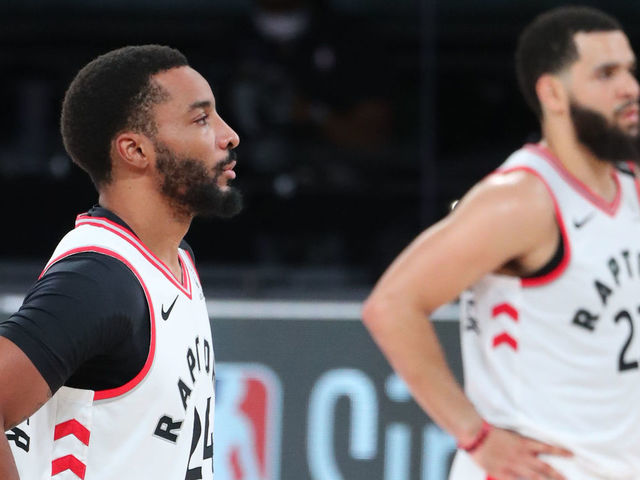 Orlando, FL - AUGUST 17: Norman Powell #24 and Fred VanVleet #23 of the Toronto Raptors looks on during the game against the Brooklyn Nets during Round One, Game One of the NBA Playoffs on August 17, 2020 in Orlando, Florida at AdventHealth Arena. NOTE TO USER: User expressly acknowledges and agrees that, by downloading and/or using this Photograph, user is consenting to the terms and conditions of the Getty Images License Agreement. Mandatory Copyright Notice: Copyright 2020 NBAE