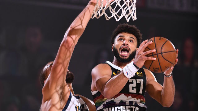 ORLANDO, FL - AUGUST 25: Jamal Murray #27 of the Denver Nuggets shoots the ball against the Utah Jazz during Round One, Game Five of the NBA Playoffs on August 25, 2020 at The Field House in Orlando, Florida. NOTE TO USER: User expressly acknowledges and agrees that, by downloading and/or using this Photograph, user is consenting to the terms and conditions of the Getty Images License Agreement. Mandatory Copyright Notice: Copyright 2020 NBAE