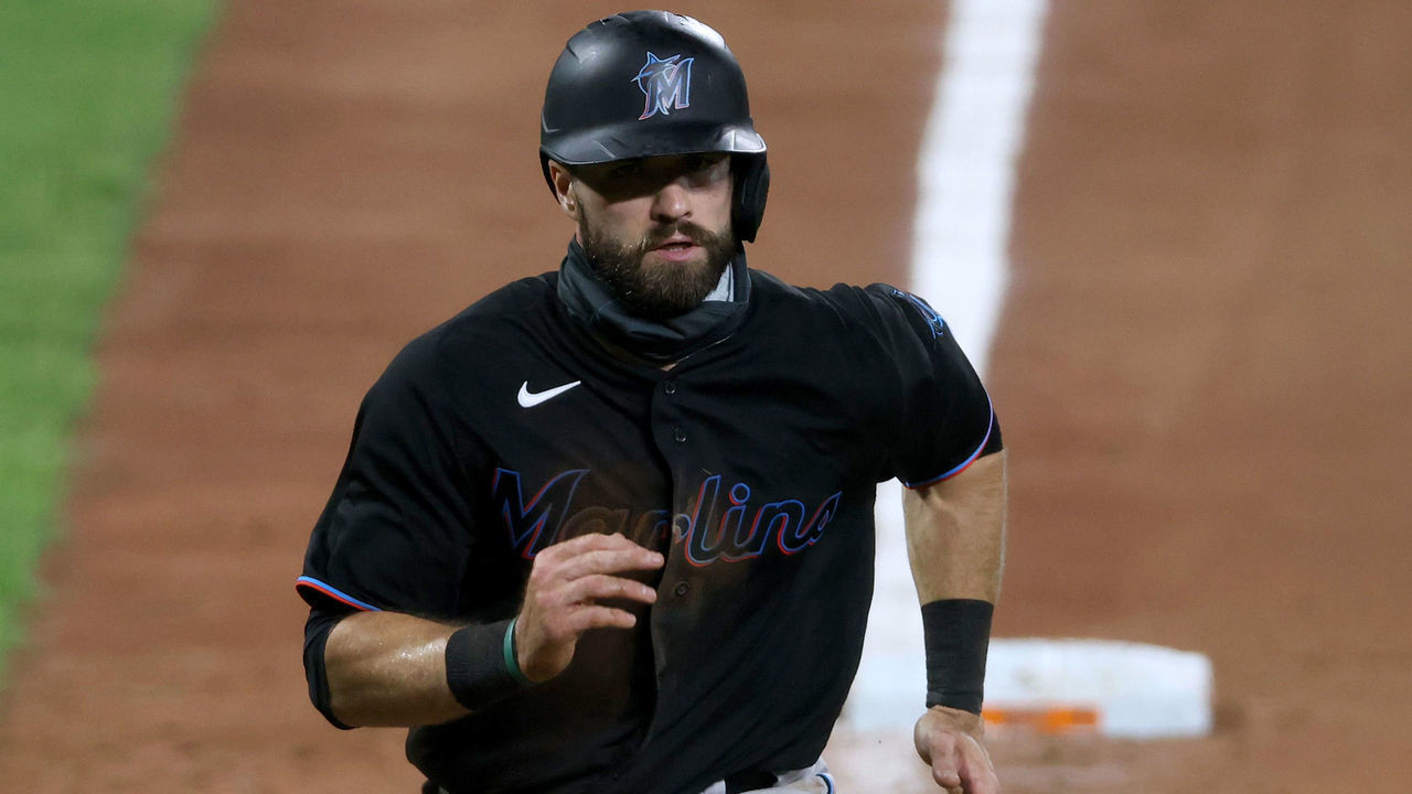 BALTIMORE, MARYLAND - AUGUST 06: Jon Berti #5 of the Miami Marlins comes in to score against the Baltimore Orioles in the seventh inning at Oriole Park at Camden Yards on August 06, 2020 in Baltimore, Maryland.