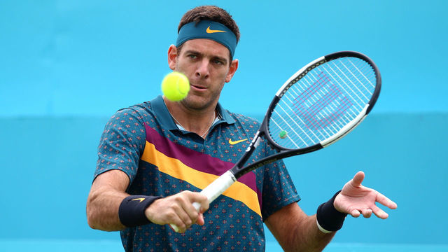 LONDON, ENGLAND - JUNE 19: Juan Martin Del Potro of Argentina hits a shot during his First Round Men's Singles match against Denis Shapovalov of Canada during day three of the Fever-Tree Championships at Queens Club on June 19, 2019 in London, United Kingdom.