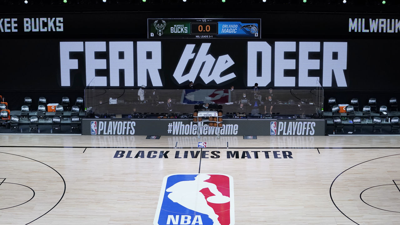 LAKE BUENA VISTA, FLORIDA - AUGUST 26: The benches are empty prior to the scheduled start of the first half of game five between the Orlando Magic and the Milwaukee Bucks in the first round of the 2020 NBA Playoffs at ESPN Wide World Of Sports Complex on August 26, 2020 in Lake Buena Vista, Florida.