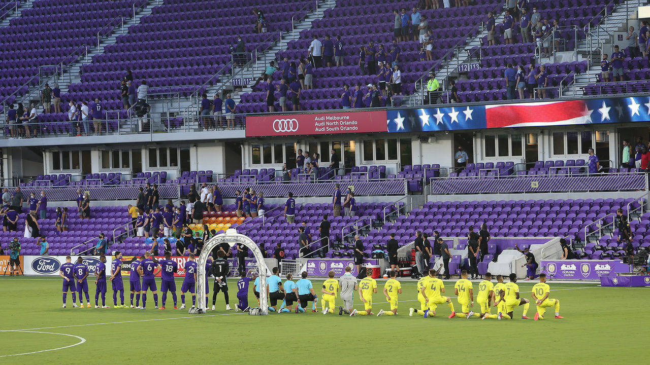 ORLANDO, FL - AUGUST 26: Members of Nashville SC kneel for the national anthem prior to a MLS soccer match against the Orlando City SC at Exploria Stadium on August 26, 2020 in Orlando, Florida.