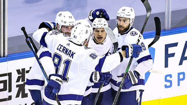 TORONTO, ONTARIO - AUGUST 26: Yanni Gourde #37 of the Tampa Bay Lightning is congratulated by his teammates after scoring a goal against the Boston Bruins during the first period in Game Three of the Eastern Conference Second Round during the 2020 NHL Stanley Cup Playoffs at Scotiabank Arena on August 26, 2020 in Toronto, Ontario.