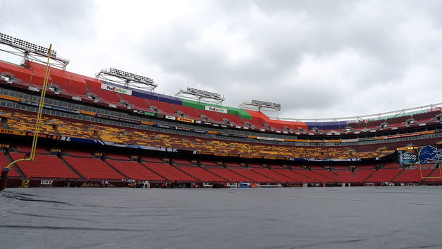 LANDOVER, MD - AUGUST 20: A tarp covers the field prior to the start of a preseason game between the Detroit Lions and the Washington Redskins at FedEx Field on August 20, 2015 in Landover, Maryland.